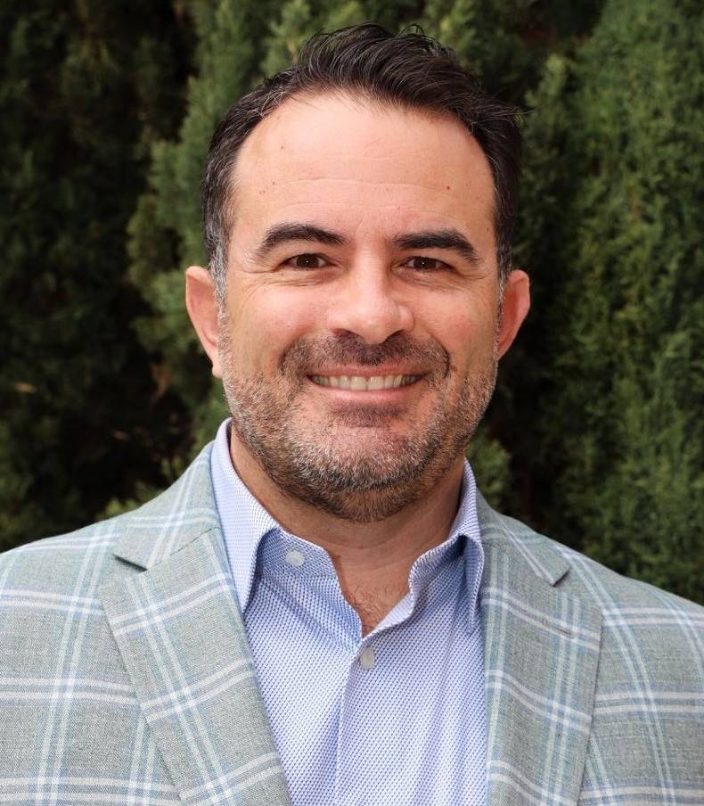 Portrait photo of Joaquin Luken, executive director of the Smart Border Collation, an organization that seeks to enhance economic ties and infrastructure in the Cali-Baja region.
